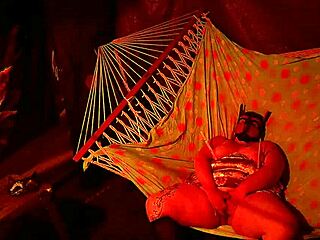 getting frisky in a tent, fingering her wet hole in a hammock