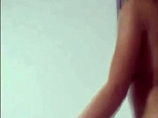 brunette babe slips into pvc panties for a tease