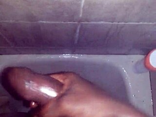 I jerk my big black monster cock in the shower and cum hard, but I slip and almost fall.