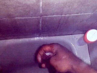 I jerk my big black monster cock in the shower and cum hard, but I slip and almost fall.