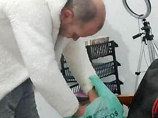 Husband steps out of shower in towel