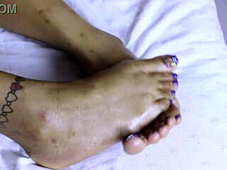 Sexy thick ebony girl gives footjob, making him cum all over her pretty feet.