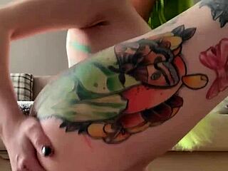 This young girl enjoys anal fingering and fisting deeply.