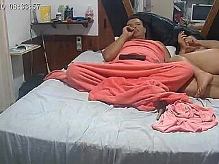 Nordestina smokes naked, showing her big hairy ass.