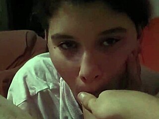 couple relaxes on sofa with amateurs