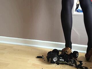 Woman's High Heels Crush Small Toy Car In The Garage Setting With Various Shoes And Toys.