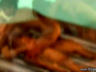 a couple enjoys an oiled massage together