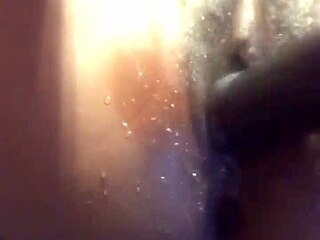 squirting ebony babe explores wild dildo play with lesbian partner