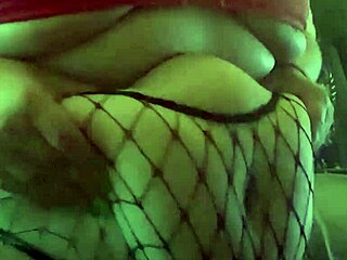 chubby teen in fishnets plays with belly