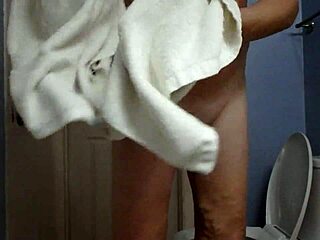 ericacd steps out of the shower, inviting you to dress together in crossdressing fun