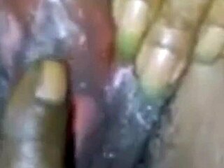 Ebony milf squirts while sucking big black cock