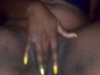 ebony babe fingers wet pussy for cum