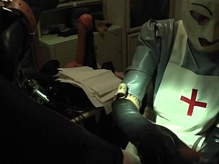 Rubbernurse Agnes Teases in Grey Latex Dress