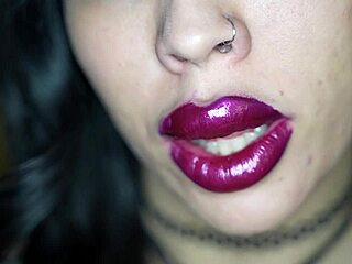 Extreme bimbo with lipstick sucking cock in fetish style