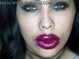 Extreme bimbo with lipstick sucking cock in fetish style