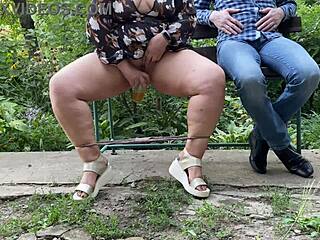 Sexy milf with stunning legs pisses in glass for stranger