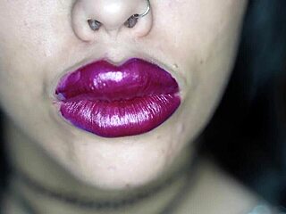 Extreme bimbo with lipstick sucking cock in fetish style