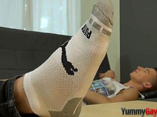 gay kinky hunk gives footjob and cums on feet