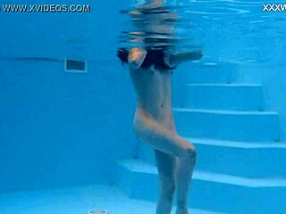 I can’t get over petite Russian Marfa swimming nude in the pool