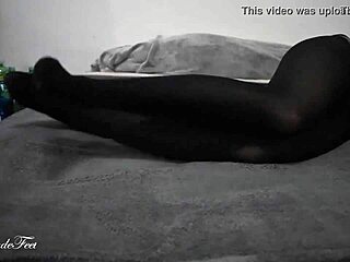 Miley grey shows off her sexy legs in nylons.