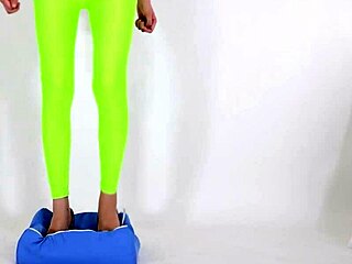 beautiful woman teases with high heels on cushion