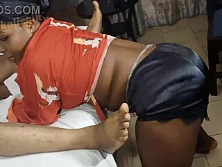 Black girl wiggles and twerks for her rich boyfriend with balloons.