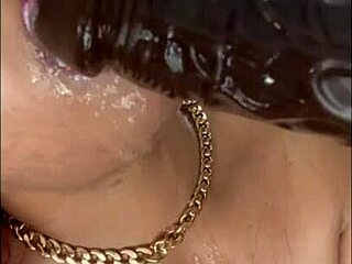 redhead ebony milf suggestively deepthroats dildo for sloppy mess