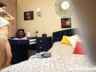 my naughty ex-girlfriend strips naked trying outfits in wardrobe.