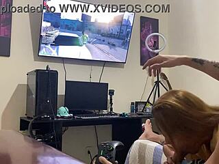 Petite brunette sucks him intensely while he plays video game!