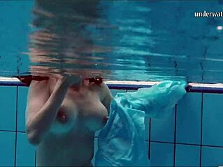 Hot Teen 18+ Swims Underwater and Strips in Pool