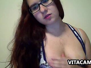 Cute cam girl rocking glasses on webcam
