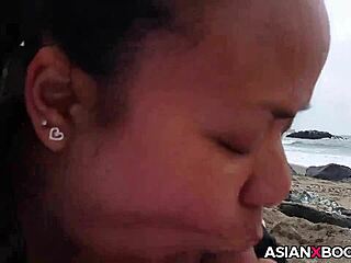 Asian babe sucks cock outdoors in high definition.