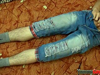 Gay dude engages in footjob fetish by sniffing shoe during solo masturbation