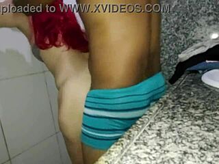 Redhead bent over in work bathroom