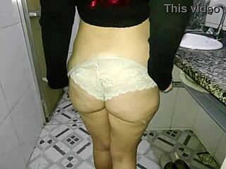 Redhead bent over in work bathroom