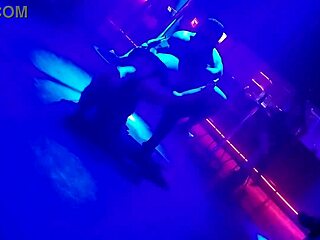 Go-go dancer pulls married brunette to dance and lifts her dress?