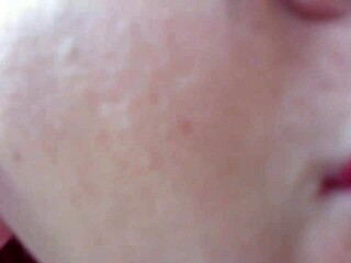 Nicoletta tries on earrings in her condominium garden for ear lovers