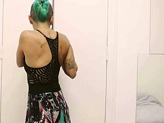Short Tattooed Girl with Green Hair Feels Thrill of Hot Striptease