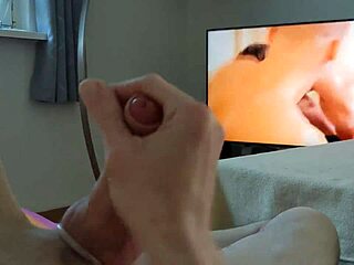 Hairy gay watches his own masturbation with a cock ring