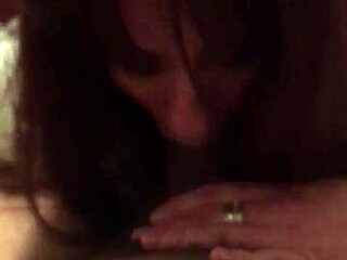 this mature white trash is sucking a small black cock so eagerly