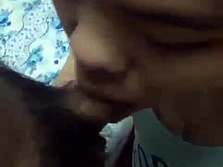 Vietnamese babe skillfully sucks cock in everyday scene