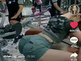 Asian girl stretching her tight ass during an intense outdoor workout session