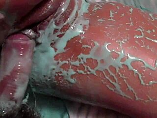 Oily wife gets messy with dildo insertion and fucked in boots.