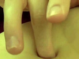 Fifi Foxx engages in detailed belly button play while topless