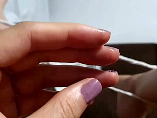 Latina pornstar masturbates on wet sofa, cum dripping down her leg