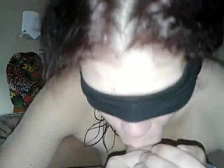 Blindfolded wife deeply sucks husband's cock
