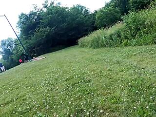 Wife flaunts thong bikini in park, flashing everyone with see-through outfit.