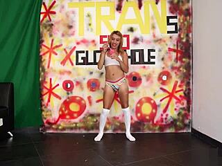 Sarita Fox Teases with Glory Hole Shemale Blowjob