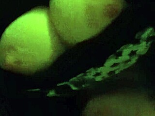 betty reddd teases her big natural tits and nipples playfully.