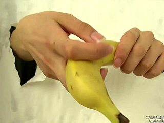 Asian Fetish Babe Crushes Banana with Hands in Messy Handjob Action